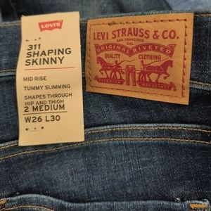 311 SHAPING SKINNYMID RISE TUMMY SLIMMING SHAPES THROUGH HIP AND THIGH 2 MED